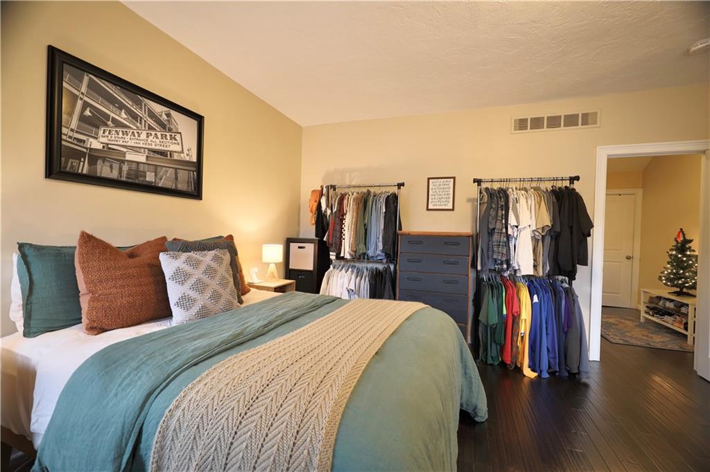 515 Lockhart Street, Unit 3 Pittsburgh, PA 15212 - Photo 24 of 27 a bed room with a bed and a walk in closet