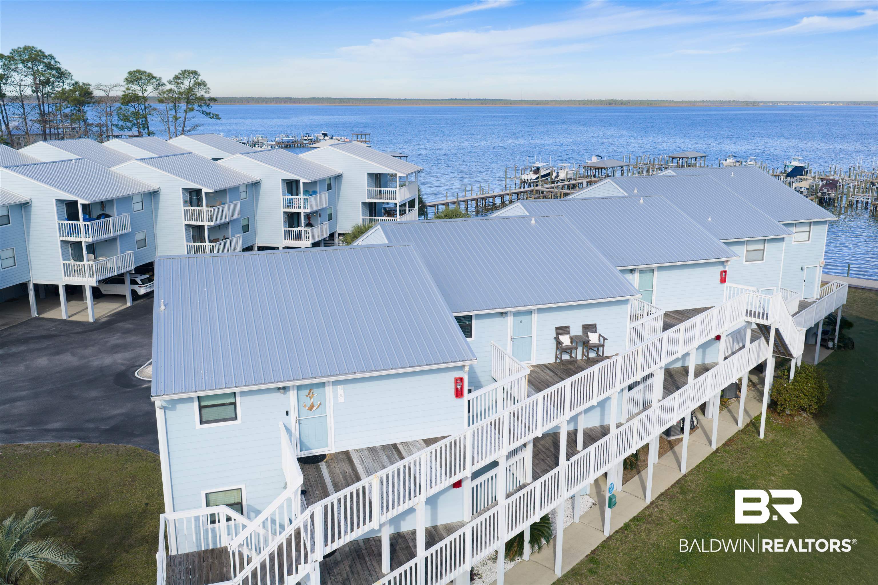 25861 Canal Road, Unit 3 Orange Beach, AL 36561 - Photo 36 of 40 Drone / aerial view of a large body of water