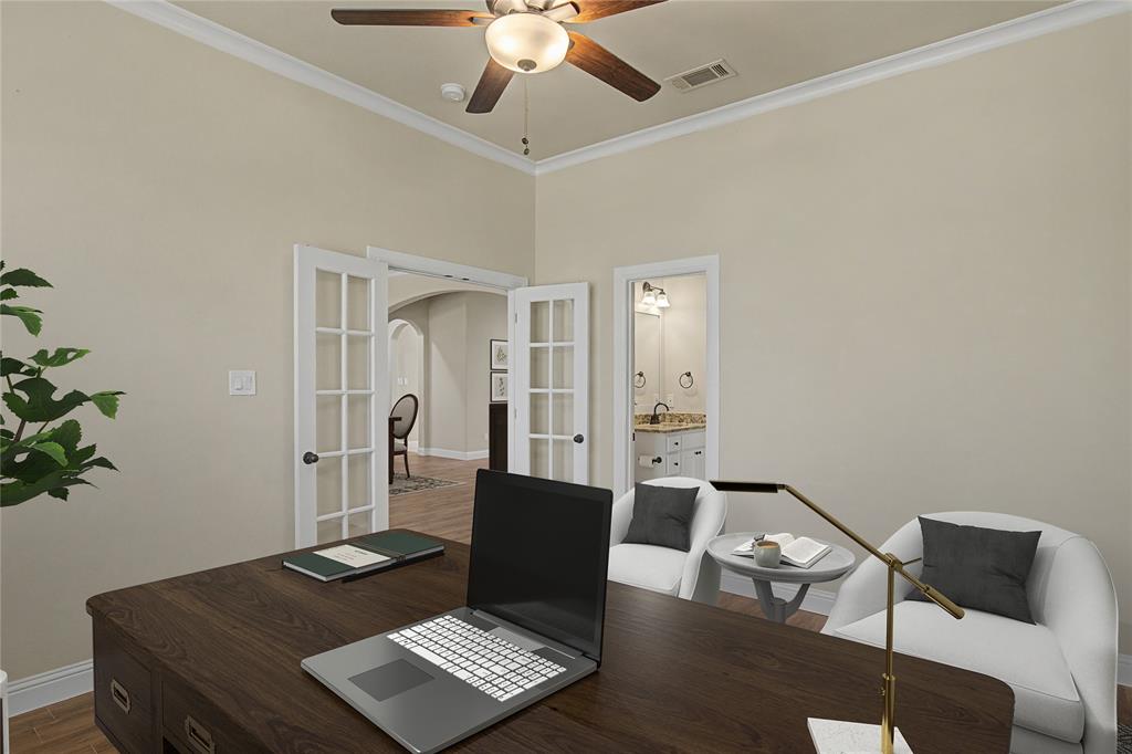 143 Wrigley Drive Springtown, TX 76082 - Photo 9 of 40 Virtually Staged - Room featuring crown molding, neutral wall tones, and wood-finish flooring