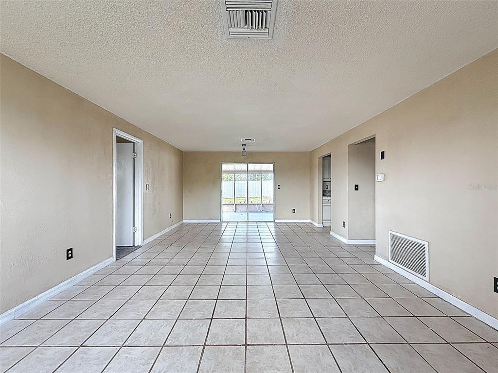 9381 Marler Road Spring Hill, FL 34608 - Photo 12 of 52 a view of an empty room and window