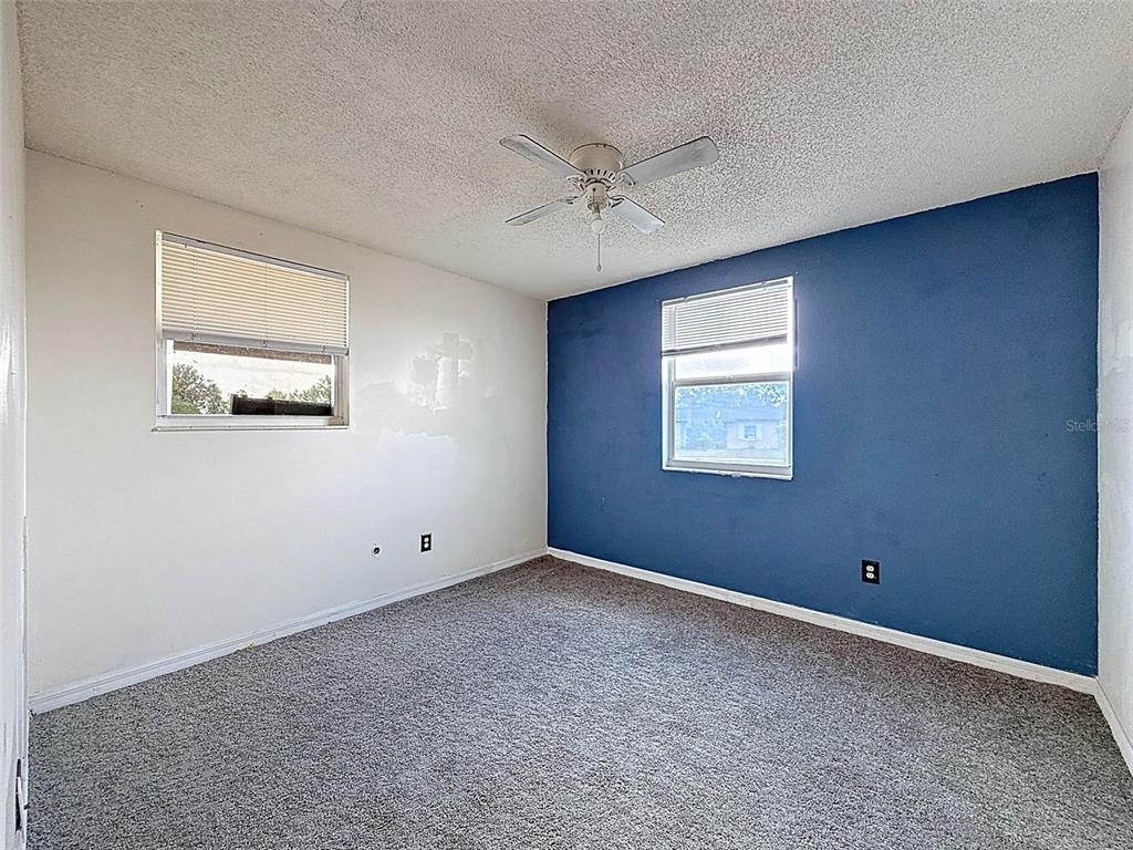 9381 Marler Road Spring Hill, FL 34608 - Photo 20 of 52 a view of an empty room with a window