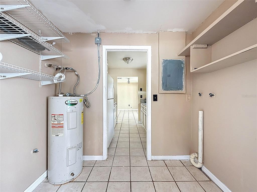 9381 Marler Road Spring Hill, FL 34608 - Photo 25 of 52 a view of a hallway view with staircase