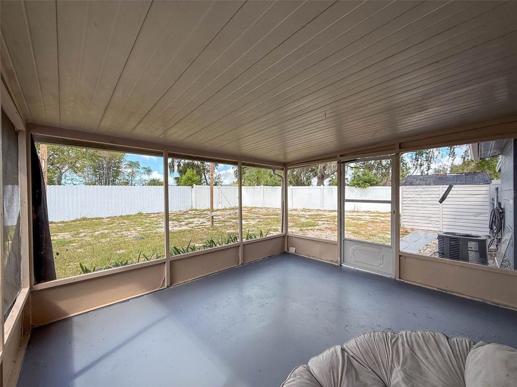9381 Marler Road Spring Hill, FL 34608 - Photo 26 of 52 a view of an empty room with a large window