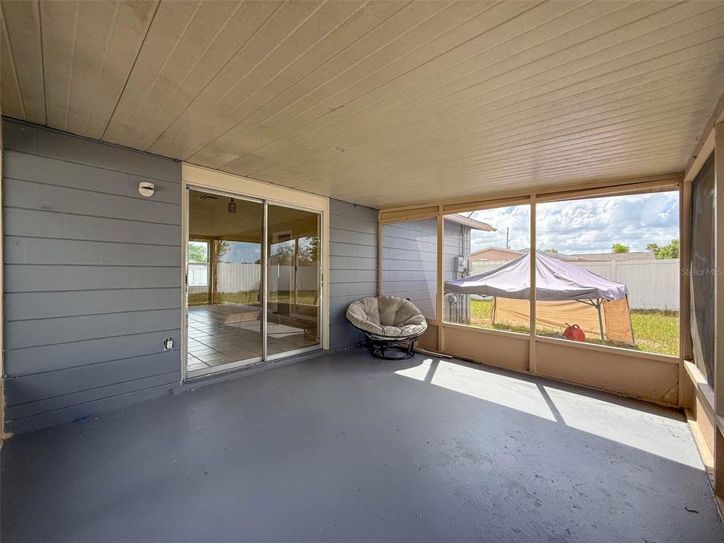 9381 Marler Road Spring Hill, FL 34608 - Photo 28 of 52 a view of empty room with sliding door