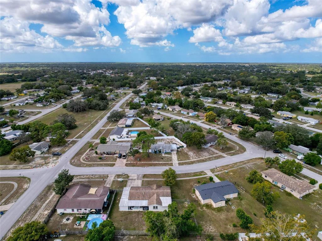 9381 Marler Road Spring Hill, FL 34608 - Photo 45 of 52 an aerial view of residential houses with outdoor space