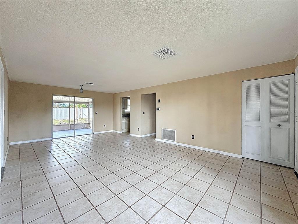 9381 Marler Road Spring Hill, FL 34608 - Photo 5 of 52 a view of an empty room and window