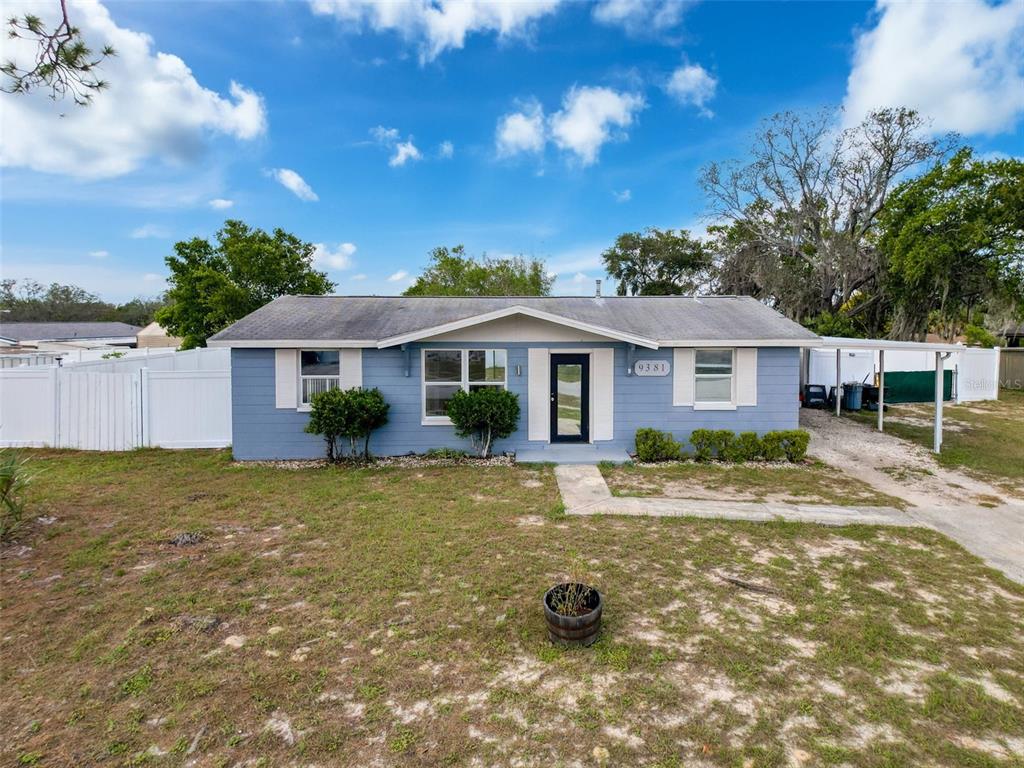 9381 Marler Road Spring Hill, FL 34608 - Photo 52 of 52 a view of a yard with a house
