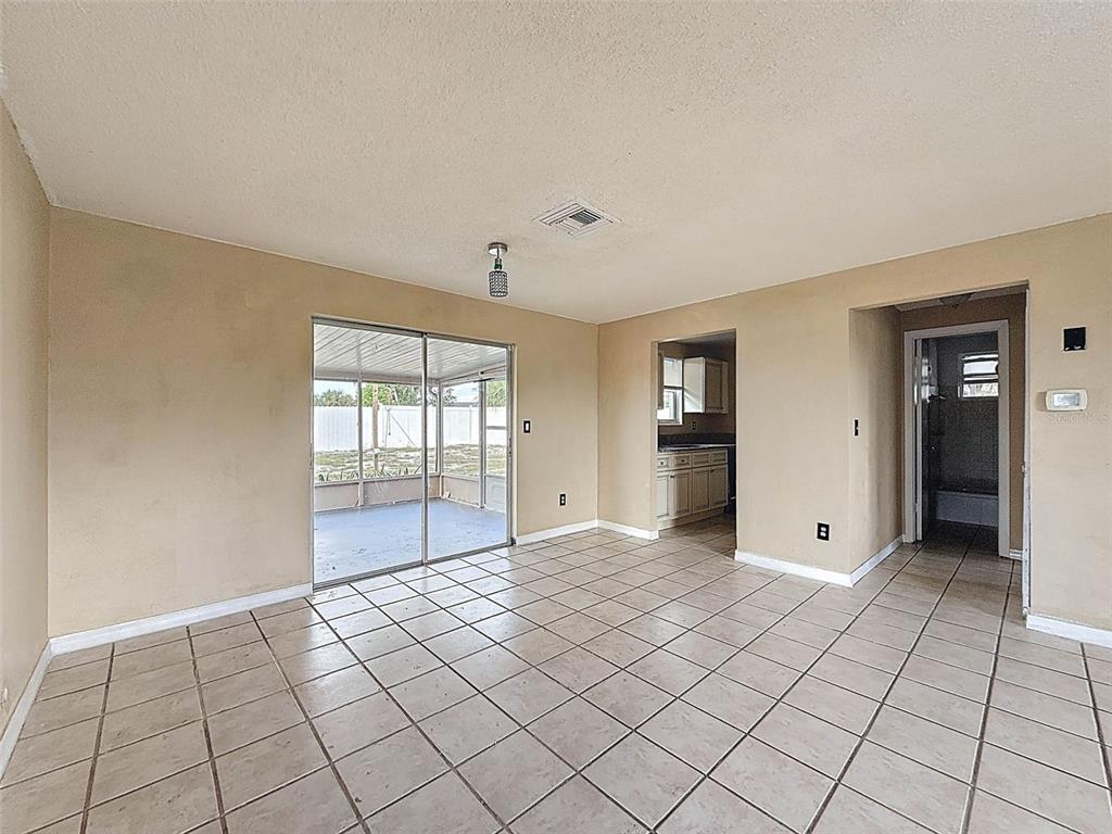 9381 Marler Road Spring Hill, FL 34608 - Photo 10 of 52 a view of an empty room and window