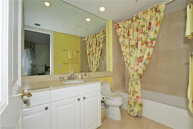 a bathroom with a sink a toilet and a bathtub