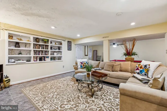 a living room with furniture and window