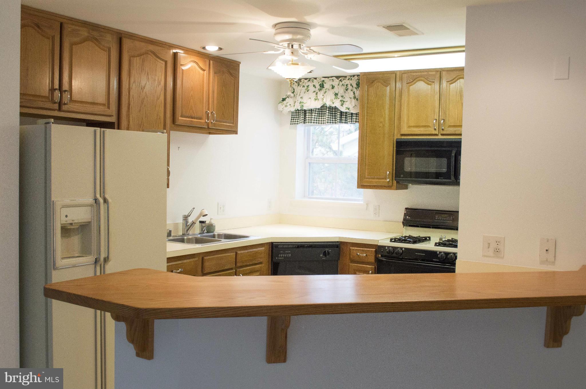 831 Runabout Loop, Unit 831 Solomons, MD 20688 - Photo 10 of 30 Kitchen