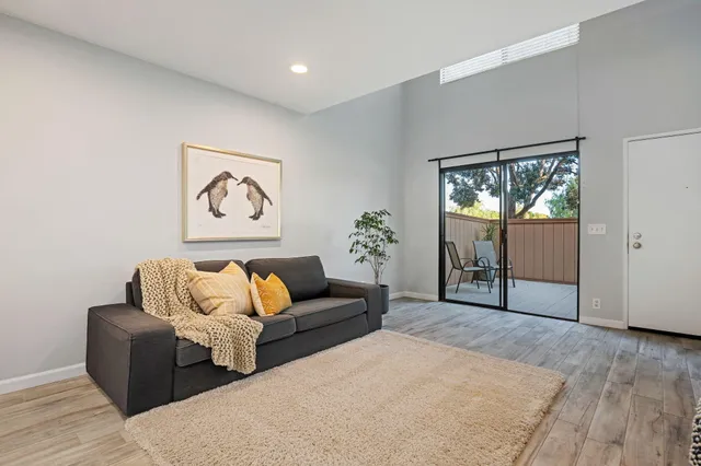 a living room with furniture and window