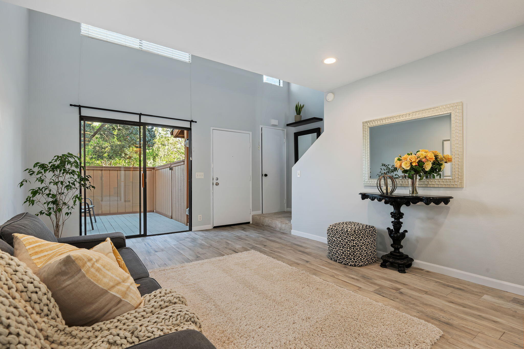 5290 Overpass Road, Unit 10 Goleta, CA 93111 - Photo 5 of 26 a bedroom with furniture and a window