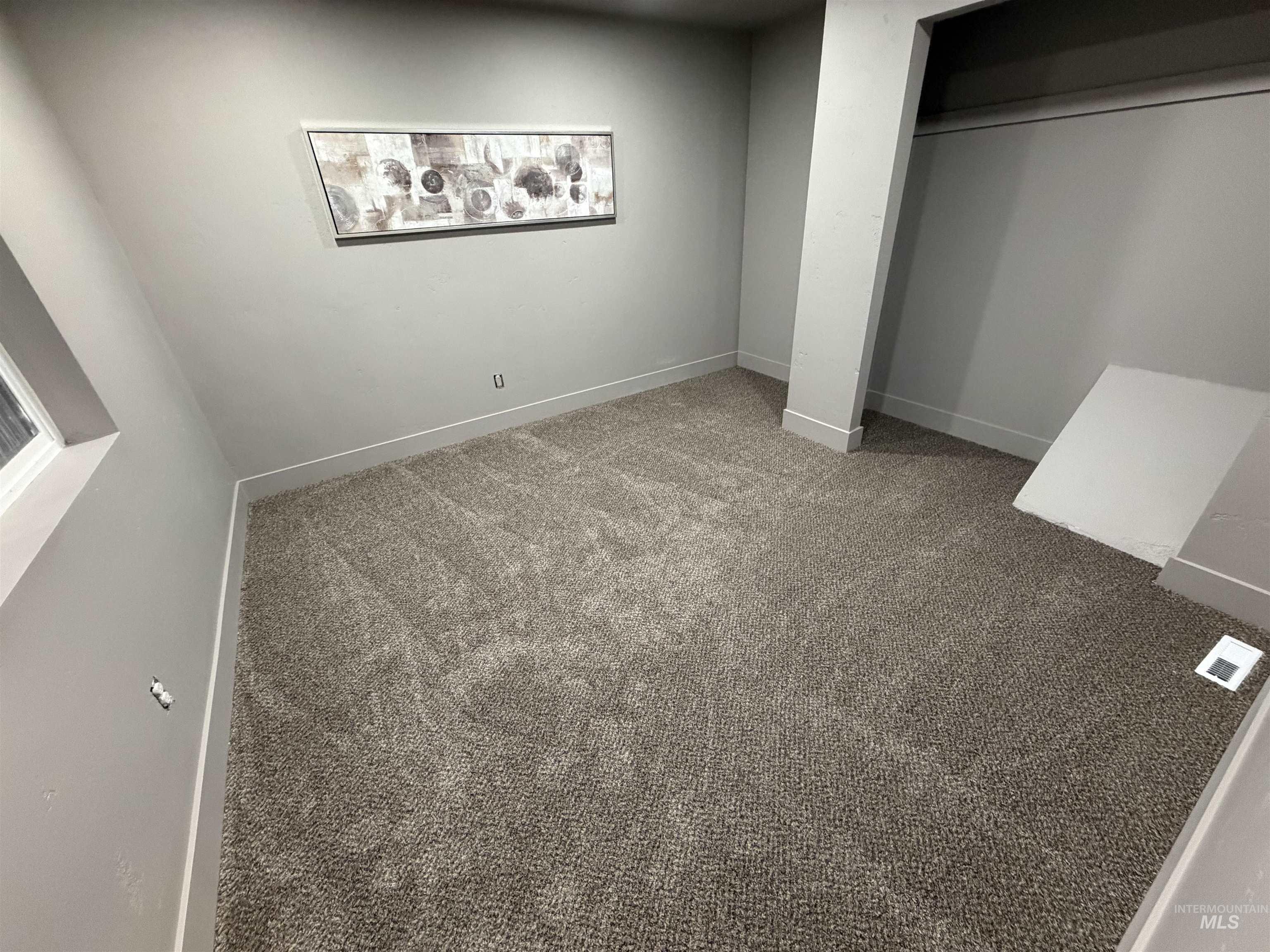 600 11th Street Clarkston, WA 99403 - Photo 16 of 27 Unfurnished bedroom featuring carpet and baseboards