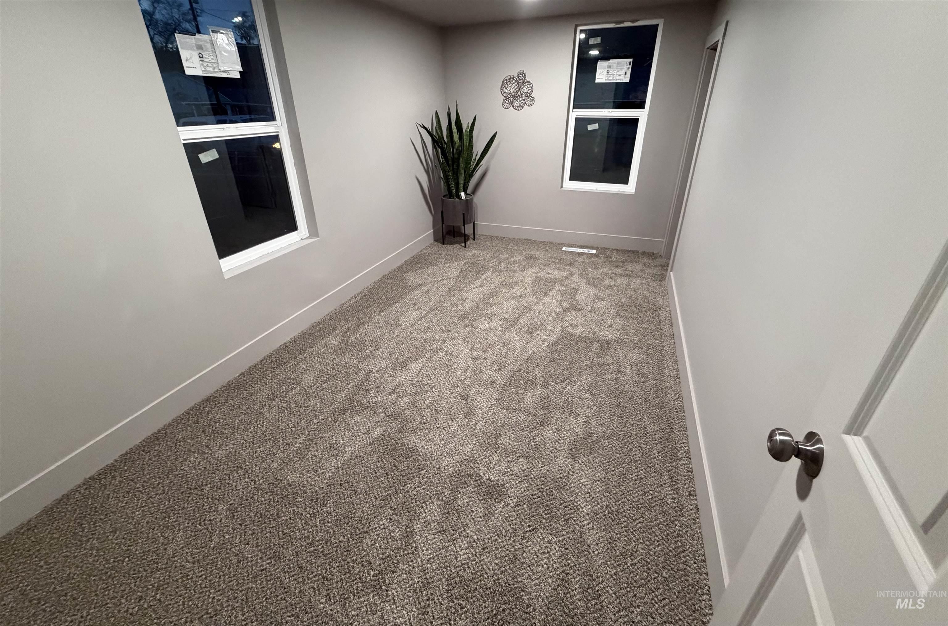 600 11th Street Clarkston, WA 99403 - Photo 24 of 27 Empty room with baseboards and light carpet