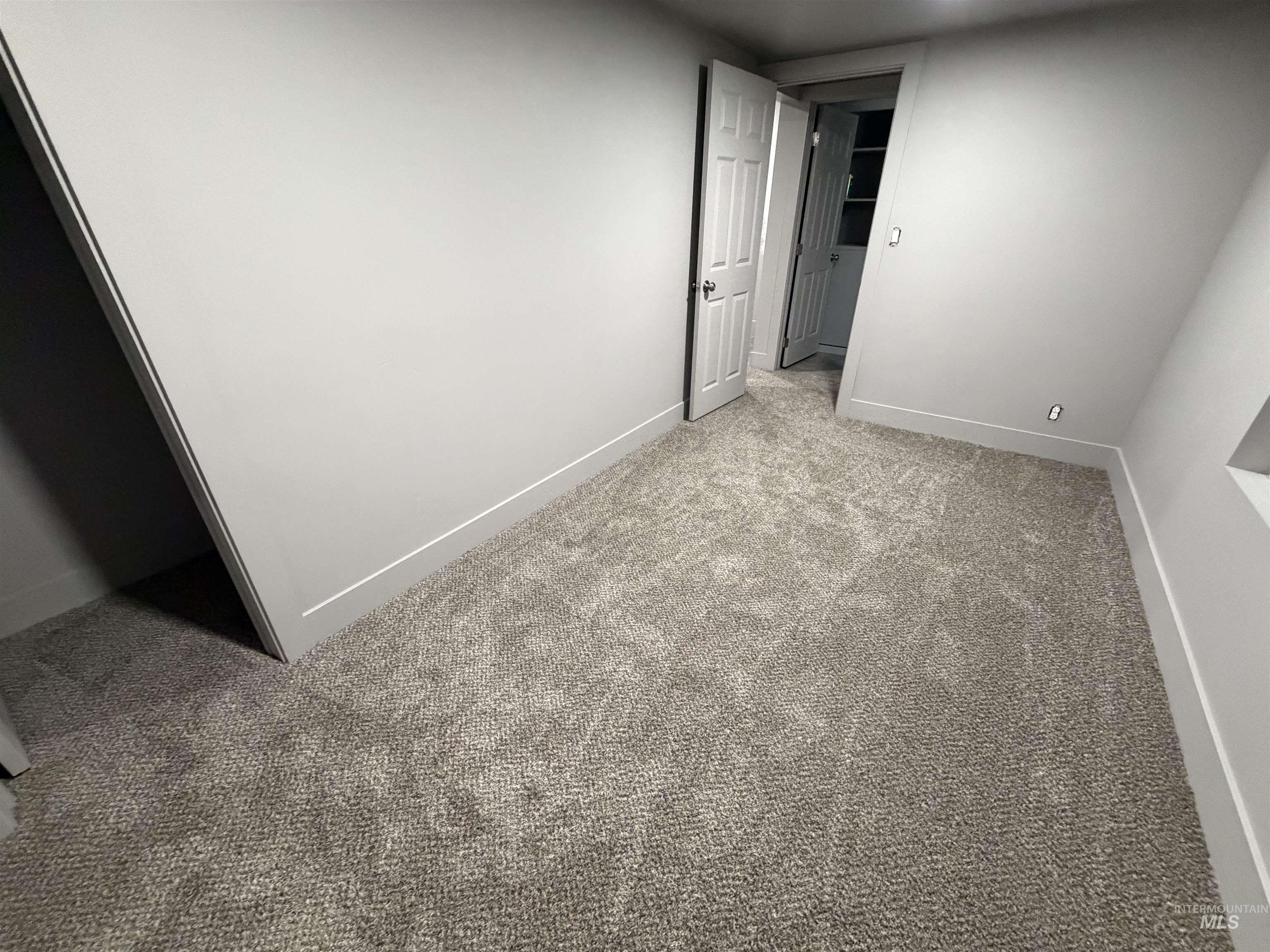 600 11th Street Clarkston, WA 99403 - Photo 25 of 27 Unfurnished bedroom with light carpet and baseboards