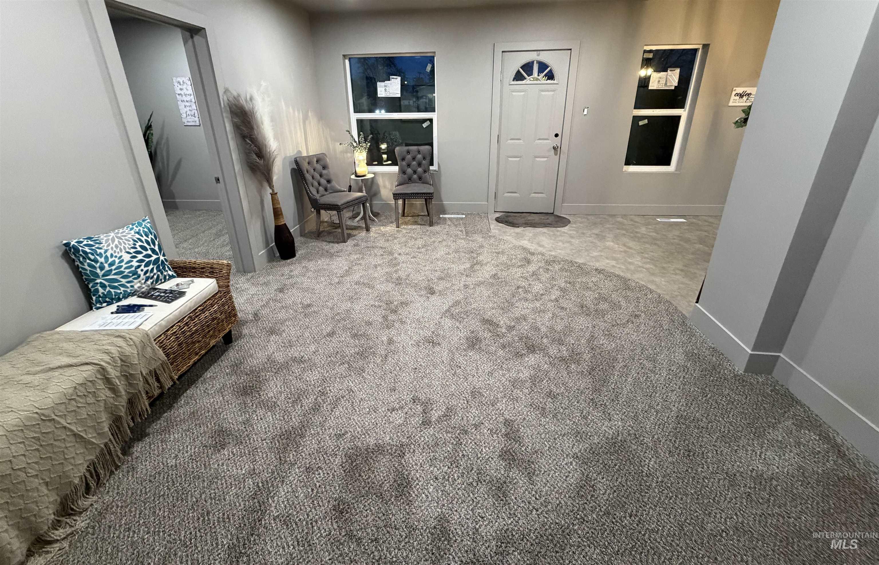 600 11th Street Clarkston, WA 99403 - Photo 27 of 27 Living area featuring light colored carpet and baseboards