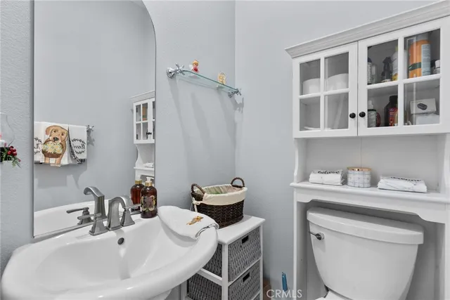 a bathroom with a sink and a toilet