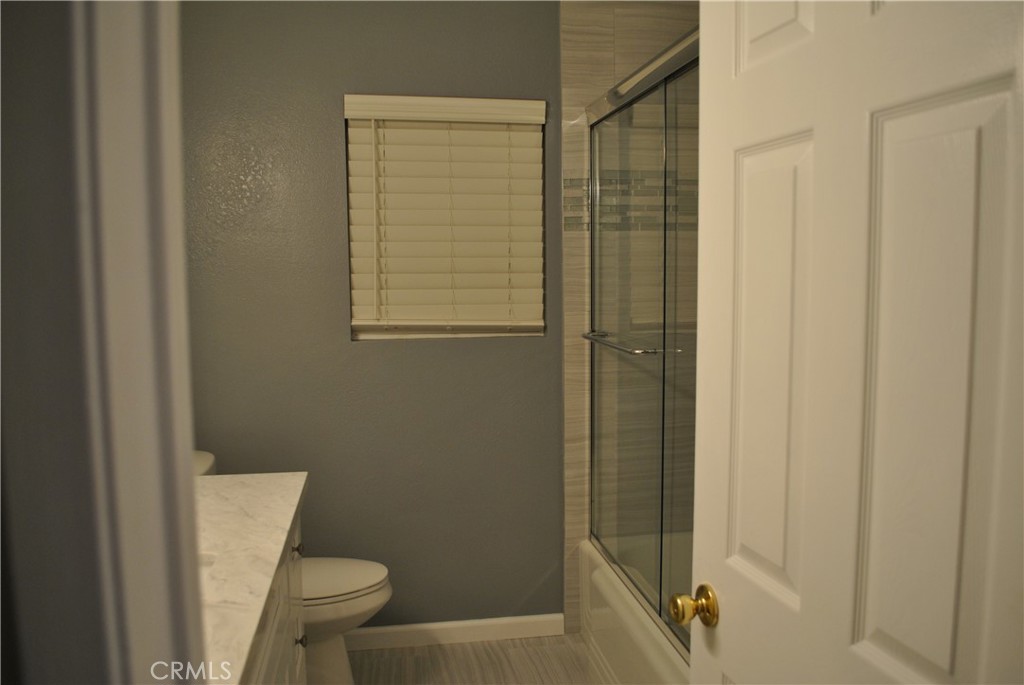 620 Stephen Road Burbank, CA 91504 - Photo 14 of 15 a bathroom with a shower and a toilet
