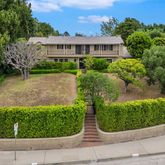 a view of a garden with a fountain