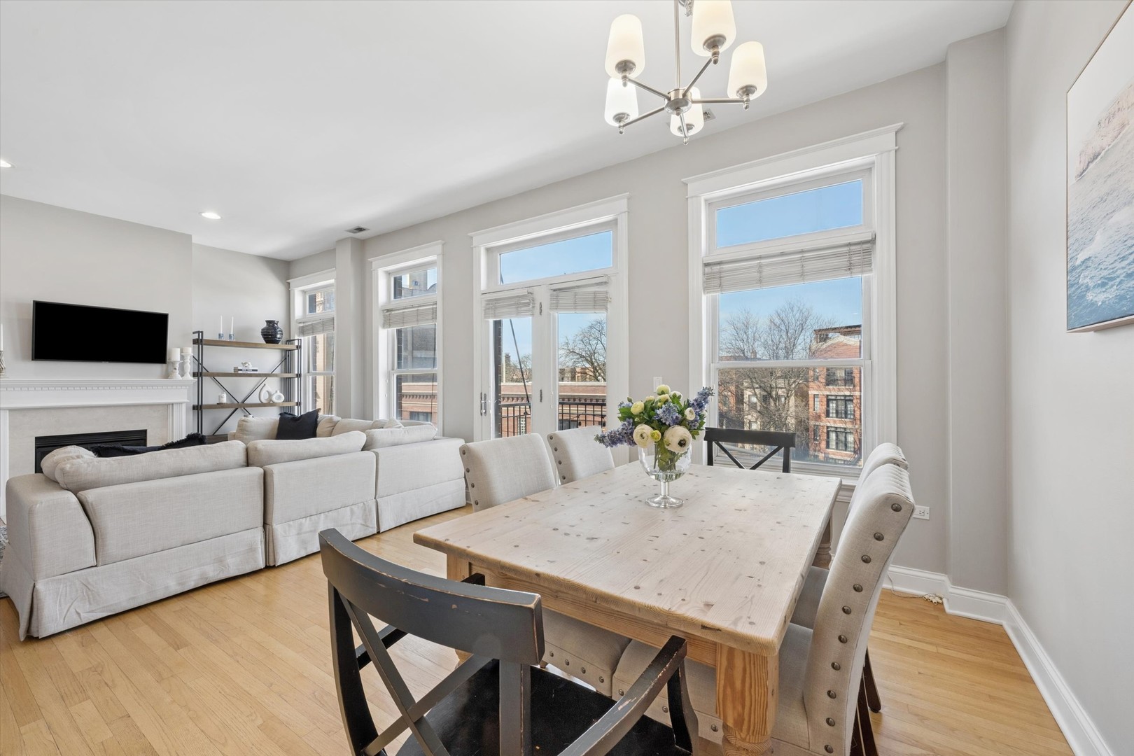 3755 North Racine Avenue, Unit 3C Chicago, IL 60613 - Photo 13 of 36 a view of a dining room with furniture window and outside view