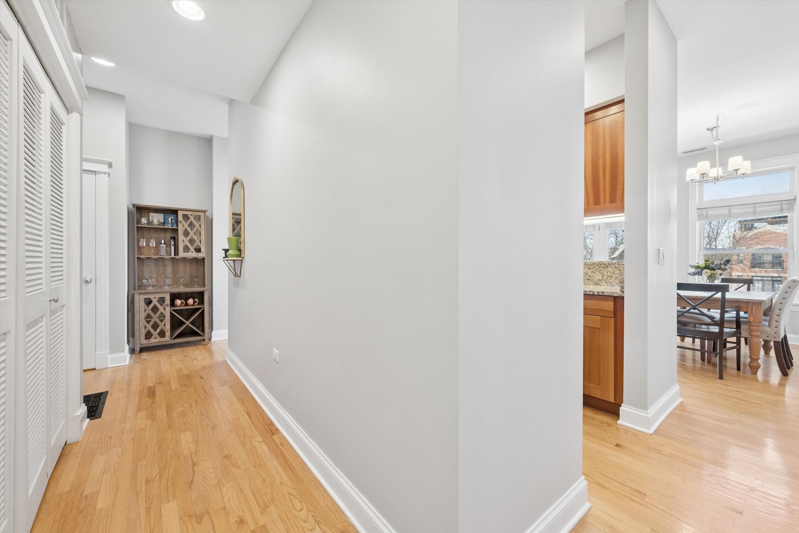 3755 North Racine Avenue, Unit 3C Chicago, IL 60613 - Photo 16 of 36 a view of a living room with windows