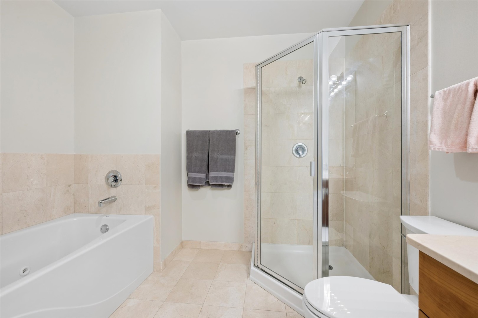 3755 North Racine Avenue, Unit 3C Chicago, IL 60613 - Photo 22 of 36 a bathroom with a shower and a toilet