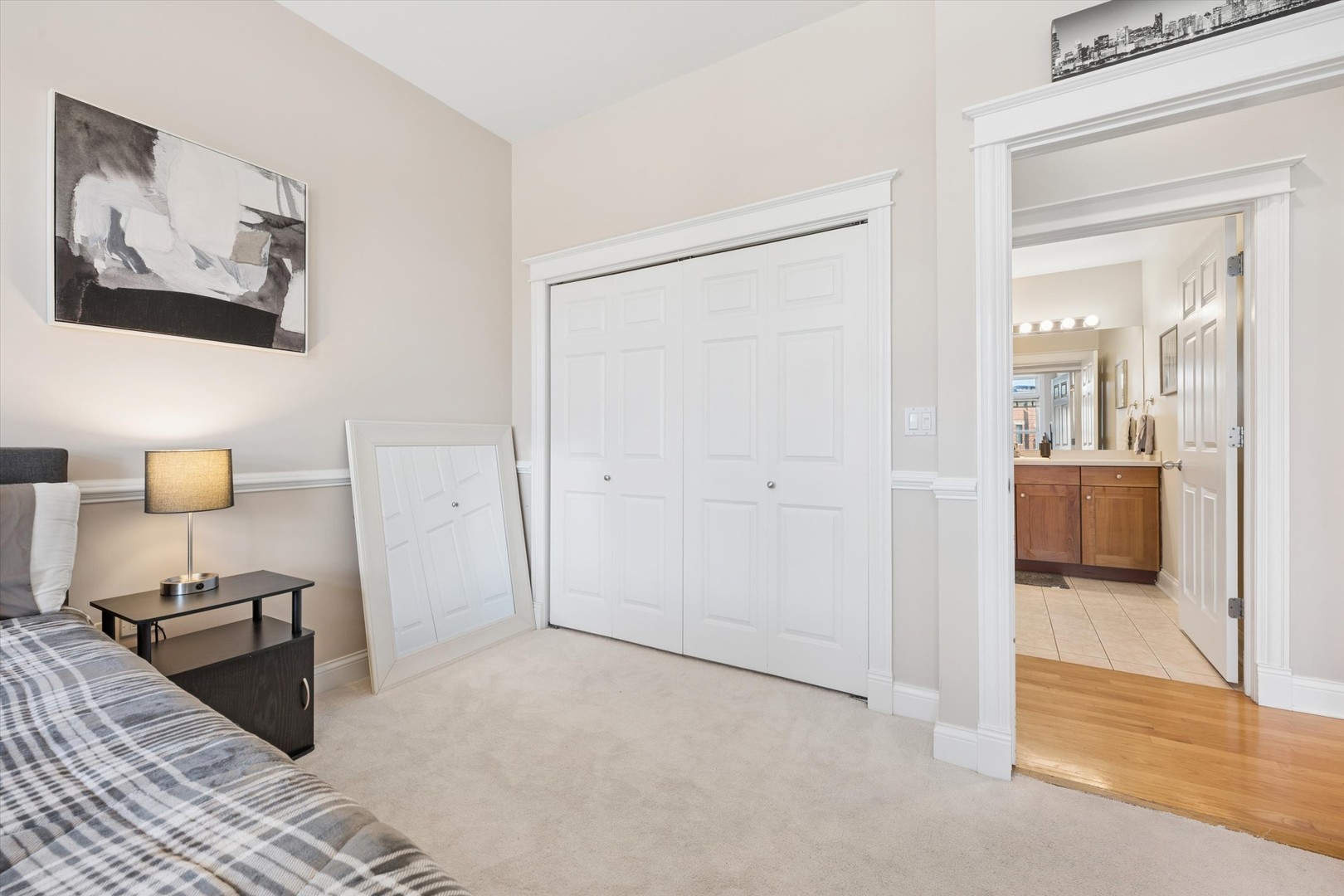3755 North Racine Avenue, Unit 3C Chicago, IL 60613 - Photo 25 of 36 a view of a bedroom from the hallway