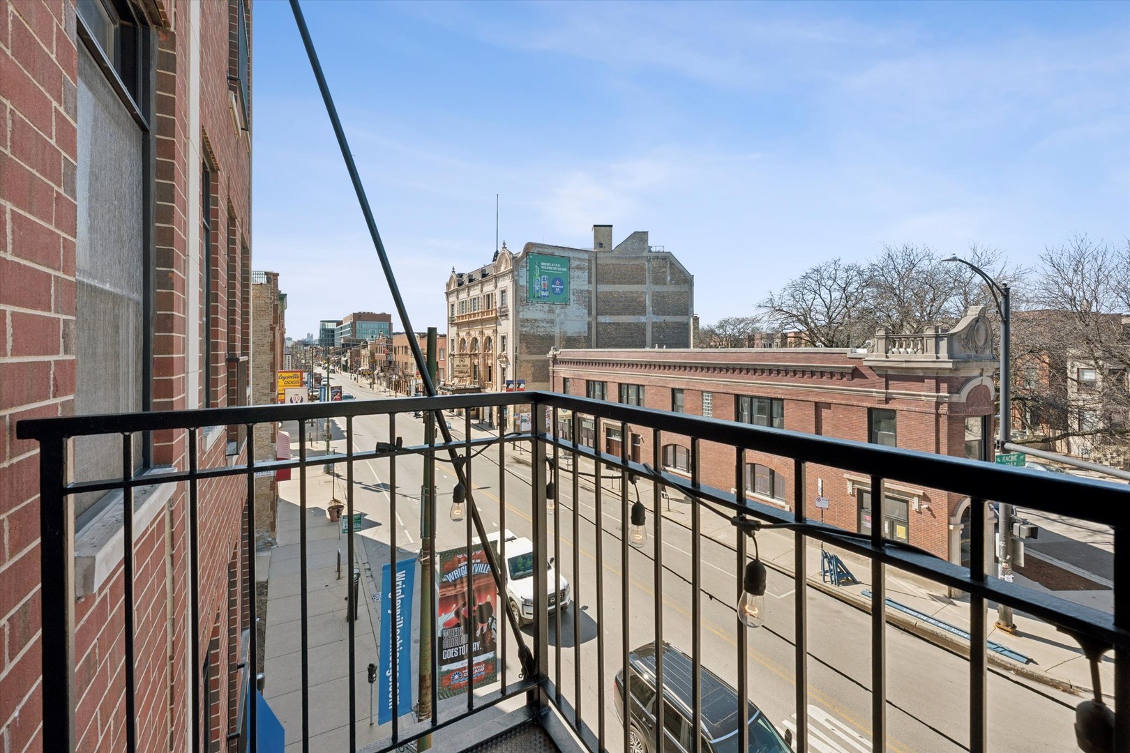 3755 North Racine Avenue, Unit 3C Chicago, IL 60613 - Photo 29 of 36 a view of city from a balcony