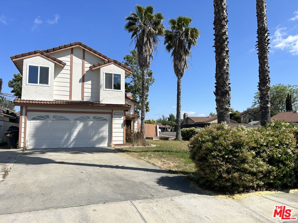 39546 Long Ridge Drive Temecula, CA 92591 - Photo 1 of 2 a front view of a house with a garden