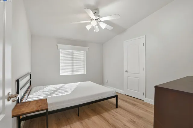 a bathroom with a sink toilet and mirror