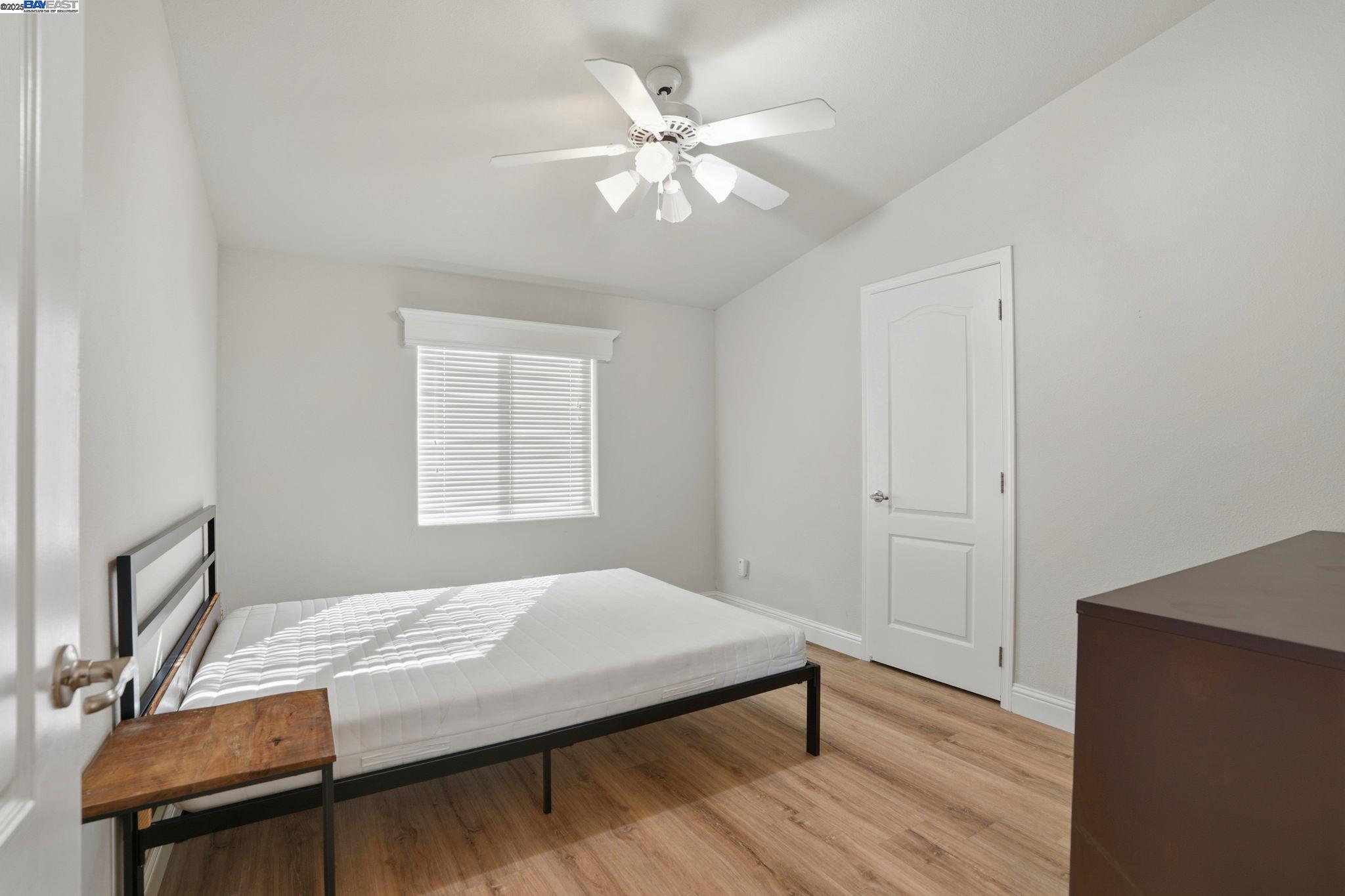 34724 Bernard Road Tracy, CA 95377 - Photo 35 of 60 a bedroom with a bed and a ceiling fan