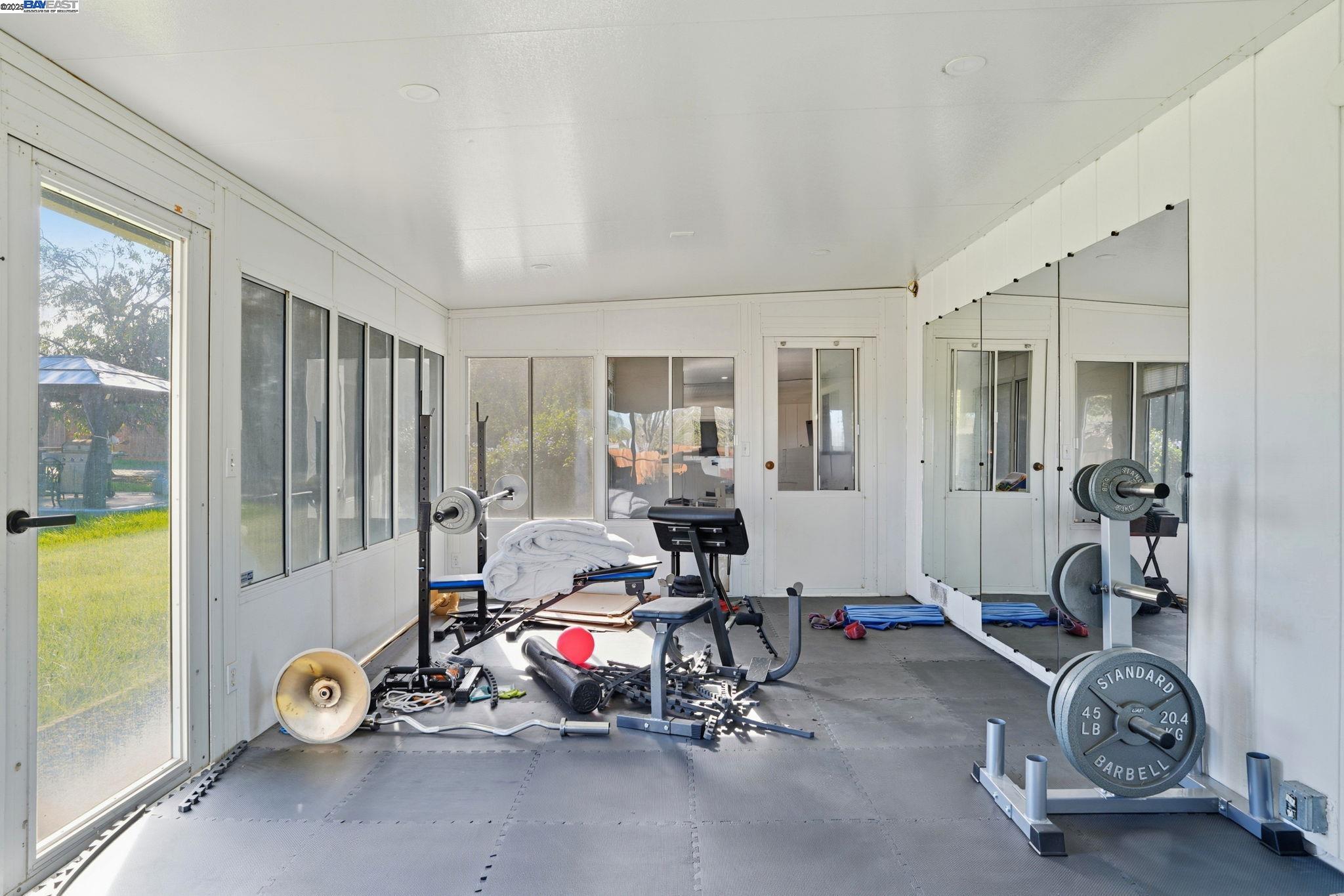 34724 Bernard Road Tracy, CA 95377 - Photo 48 of 60 a view of a room with gym equipment
