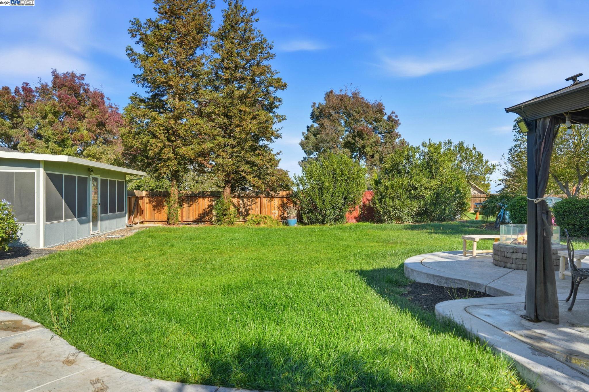 34724 Bernard Road Tracy, CA 95377 - Photo 51 of 60 a view of a garden with a tree