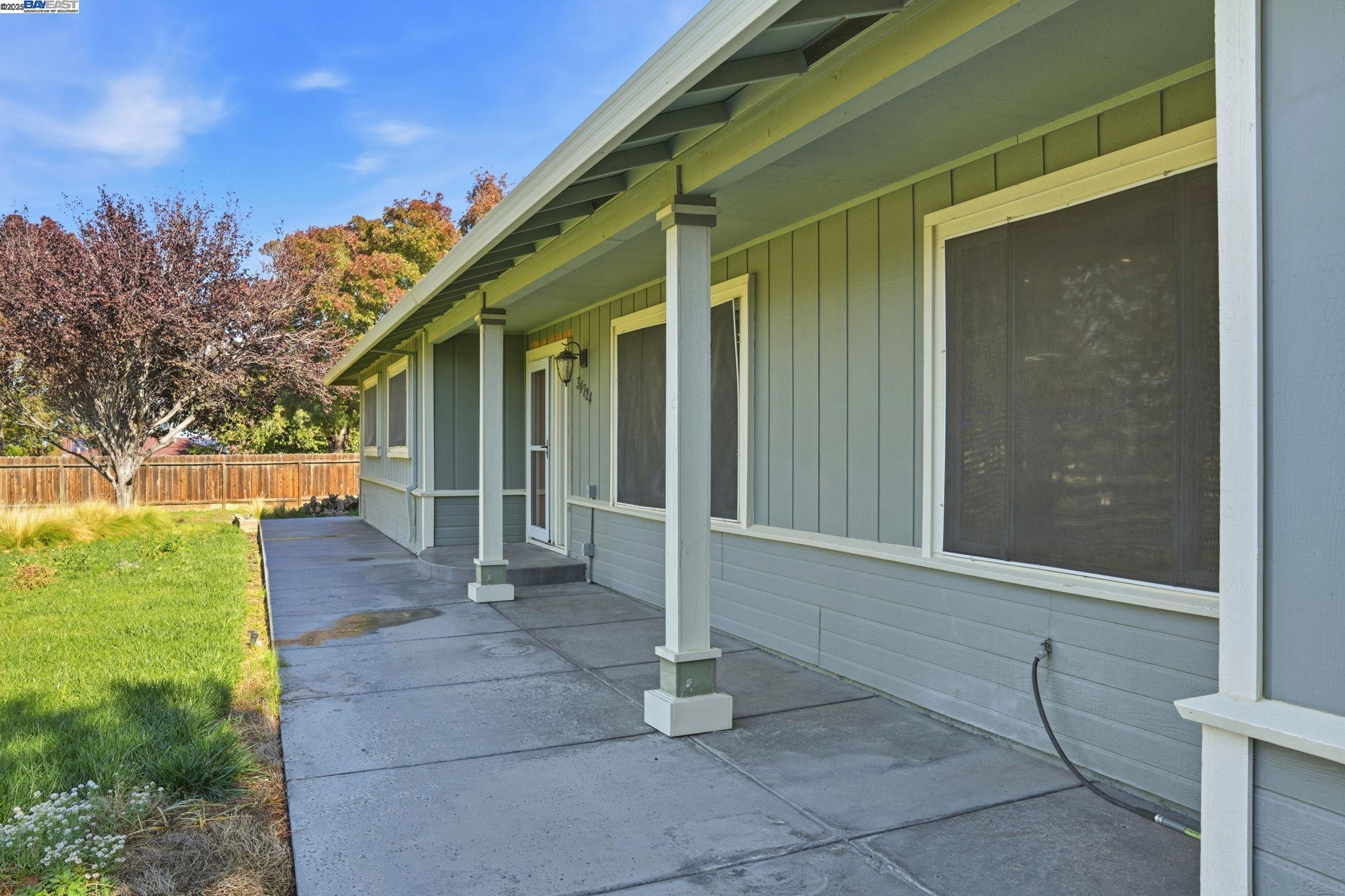 34724 Bernard Road Tracy, CA 95377 - Photo 6 of 60 a front view of a house with a yard