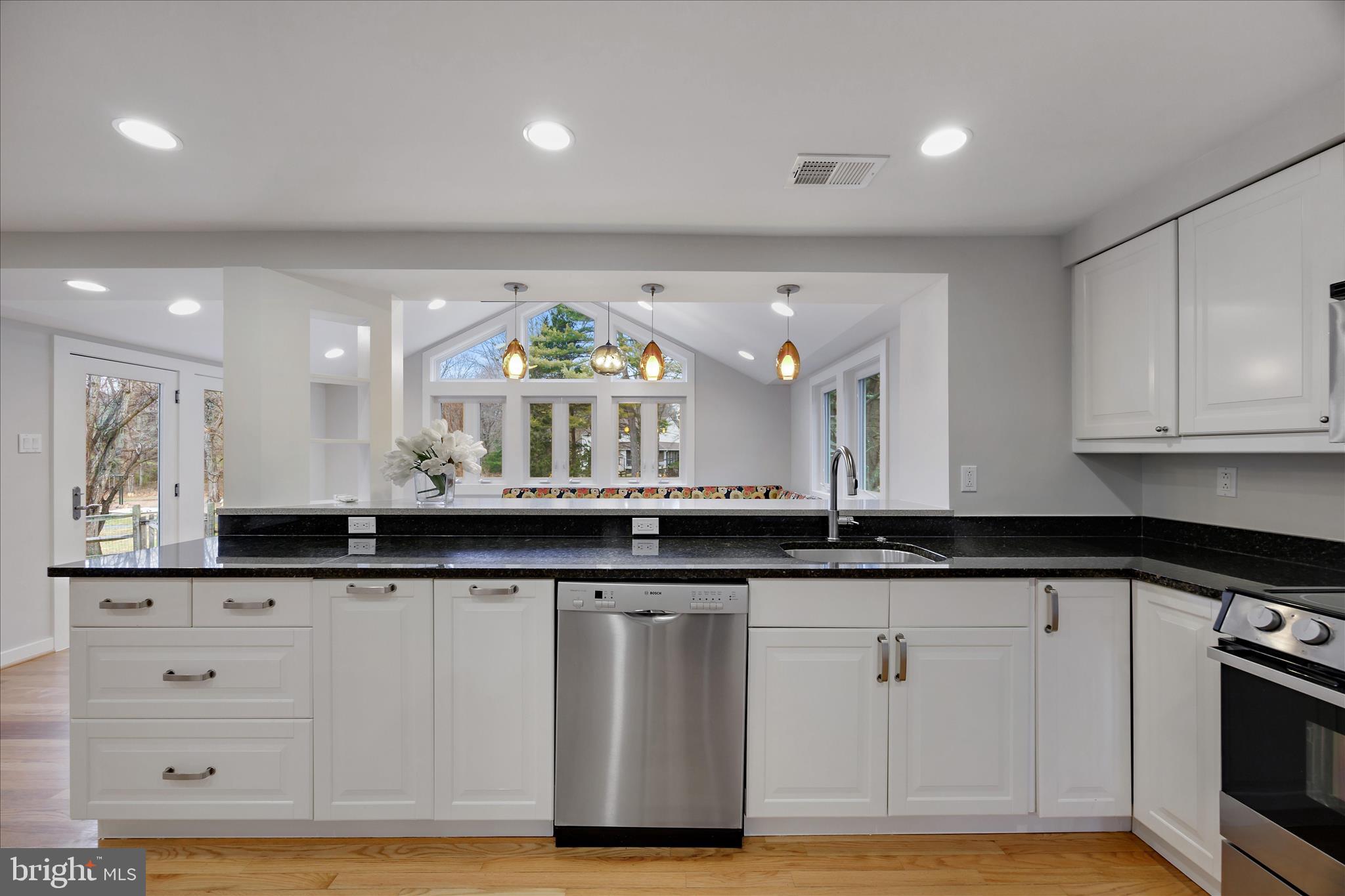 6278 Branch Beech Columbia, MD 21044 - Photo 14 of 57 a kitchen with granite countertop a sink and cabinets