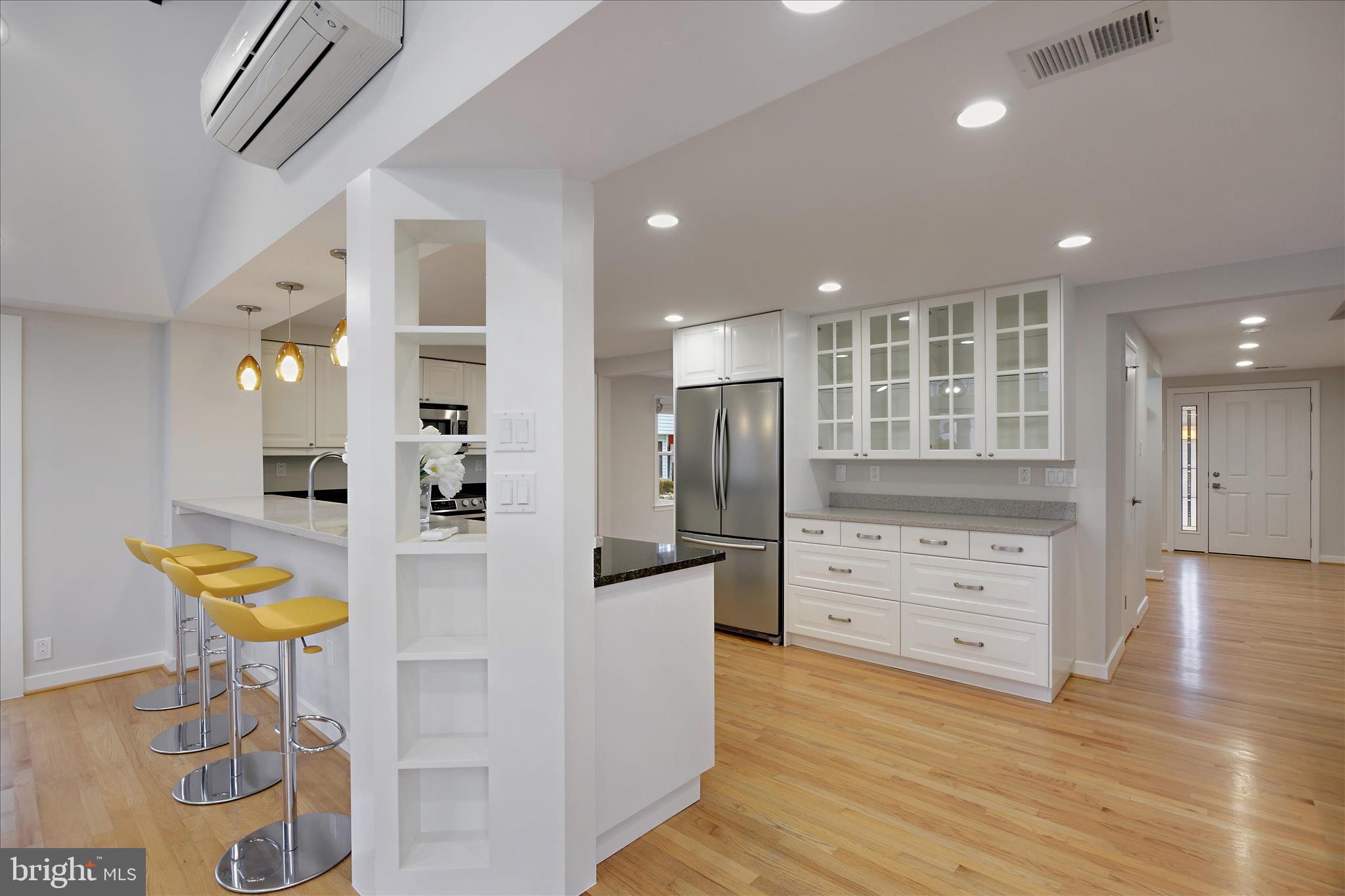 6278 Branch Beech Columbia, MD 21044 - Photo 15 of 57 a view of a kitchen with furniture and wooden floor