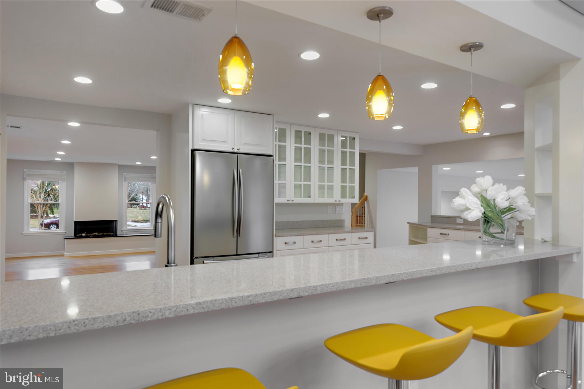 6278 Branch Beech Columbia, MD 21044 - Photo 16 of 57 a view of a kitchen with a dining table and chairs