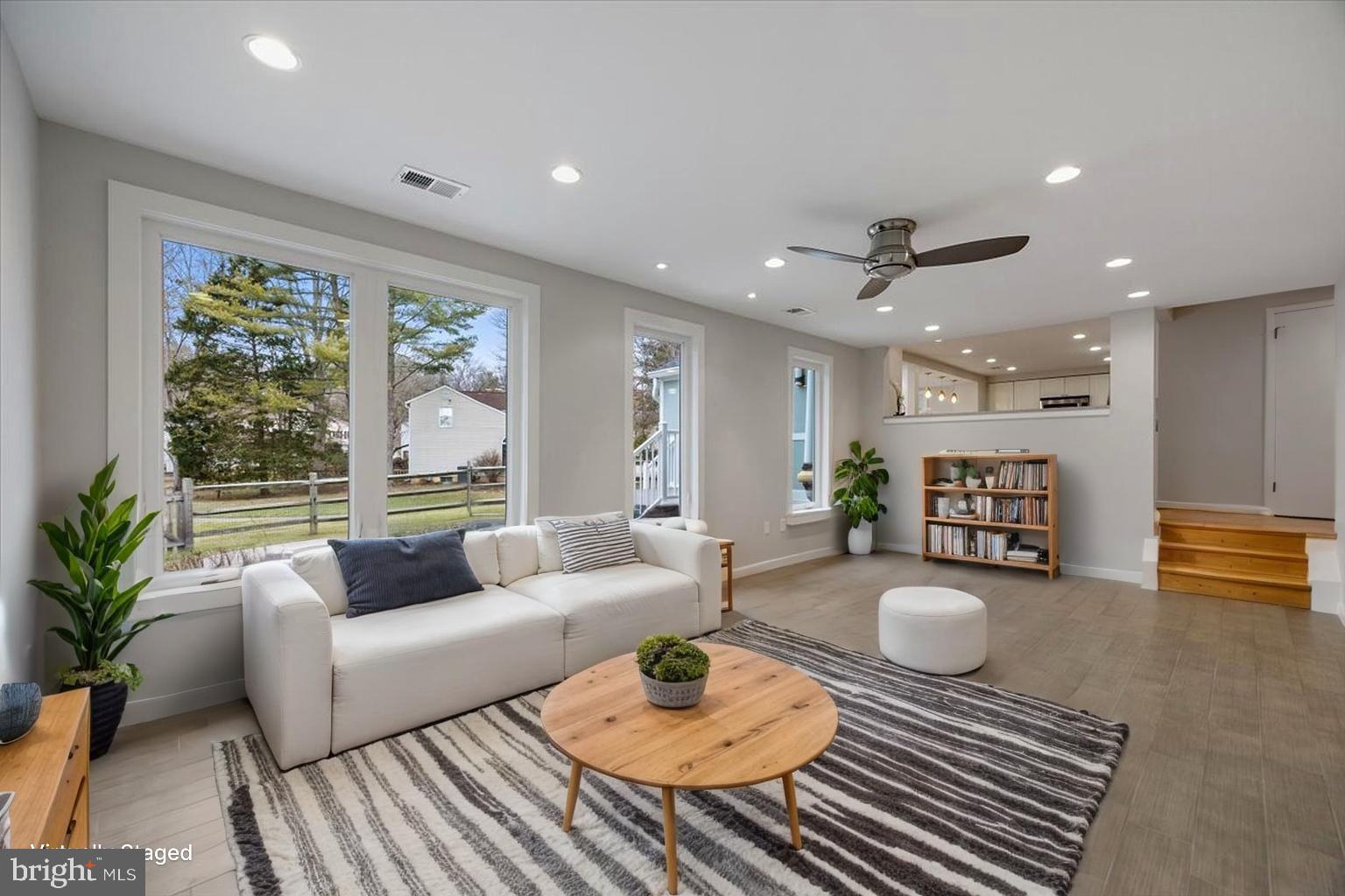 6278 Branch Beech Columbia, MD 21044 - Photo 21 of 57 a living room with furniture and a table