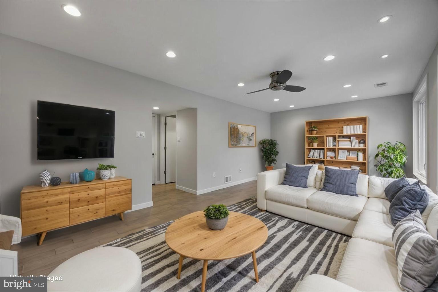 6278 Branch Beech Columbia, MD 21044 - Photo 23 of 57 a living room with furniture and a flat screen tv