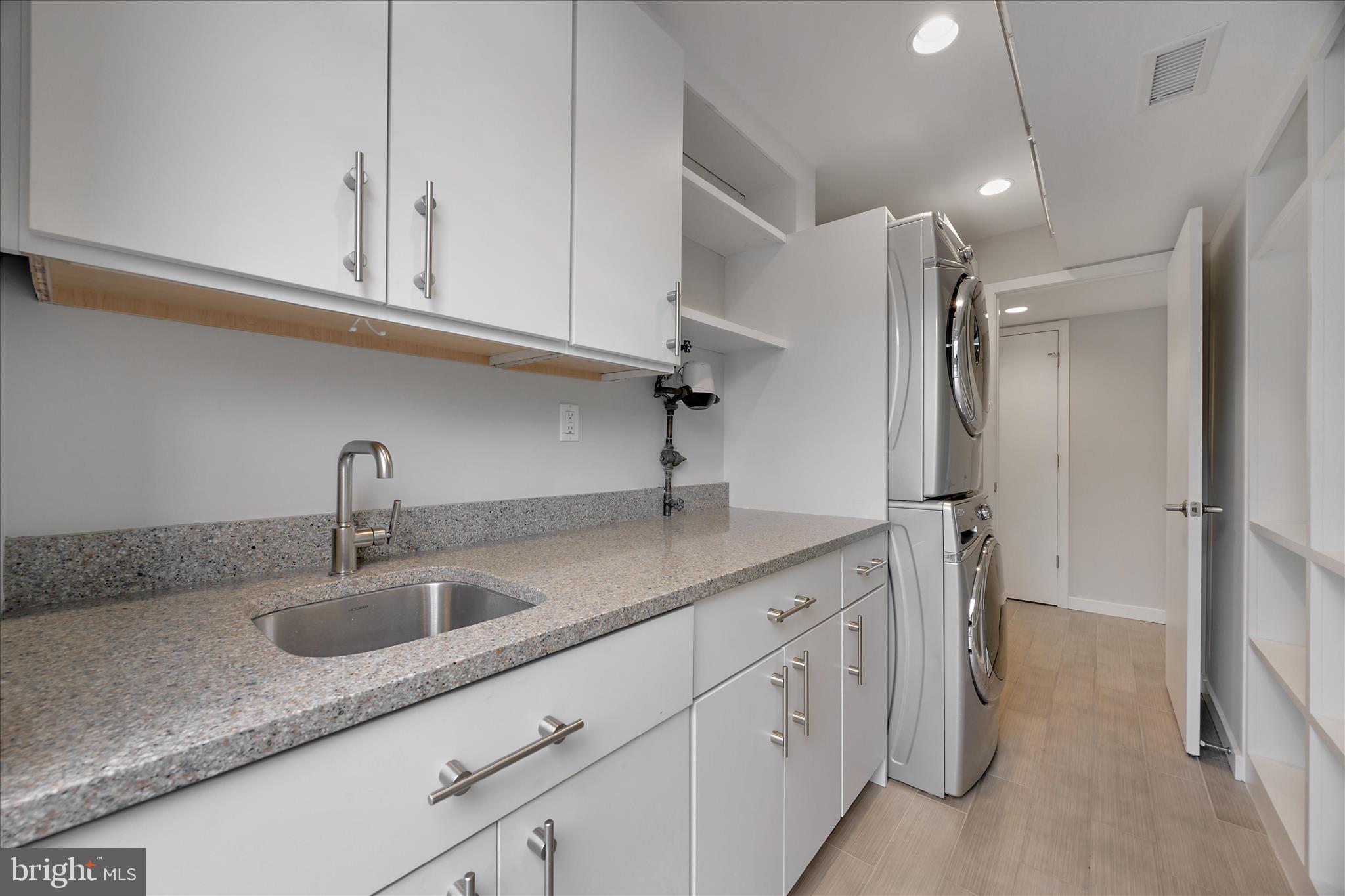 6278 Branch Beech Columbia, MD 21044 - Photo 27 of 57 a kitchen with cabinets stainless steel appliances and a sink