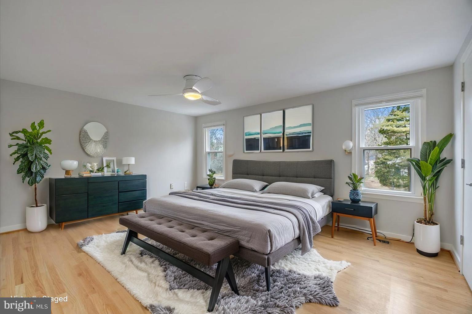 6278 Branch Beech Columbia, MD 21044 - Photo 28 of 57 a bedroom with a bed and a potted plant