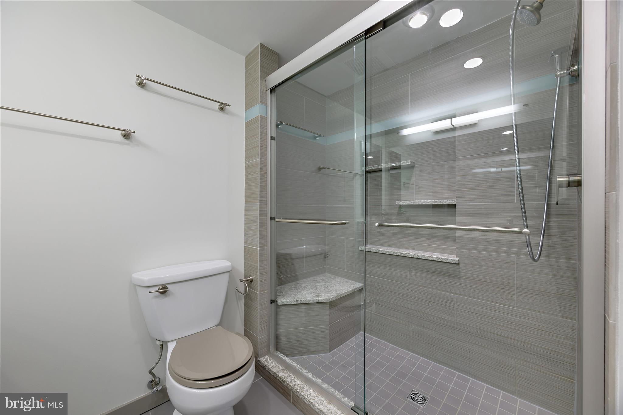 6278 Branch Beech Columbia, MD 21044 - Photo 32 of 57 a bathroom with a toilet and a shower