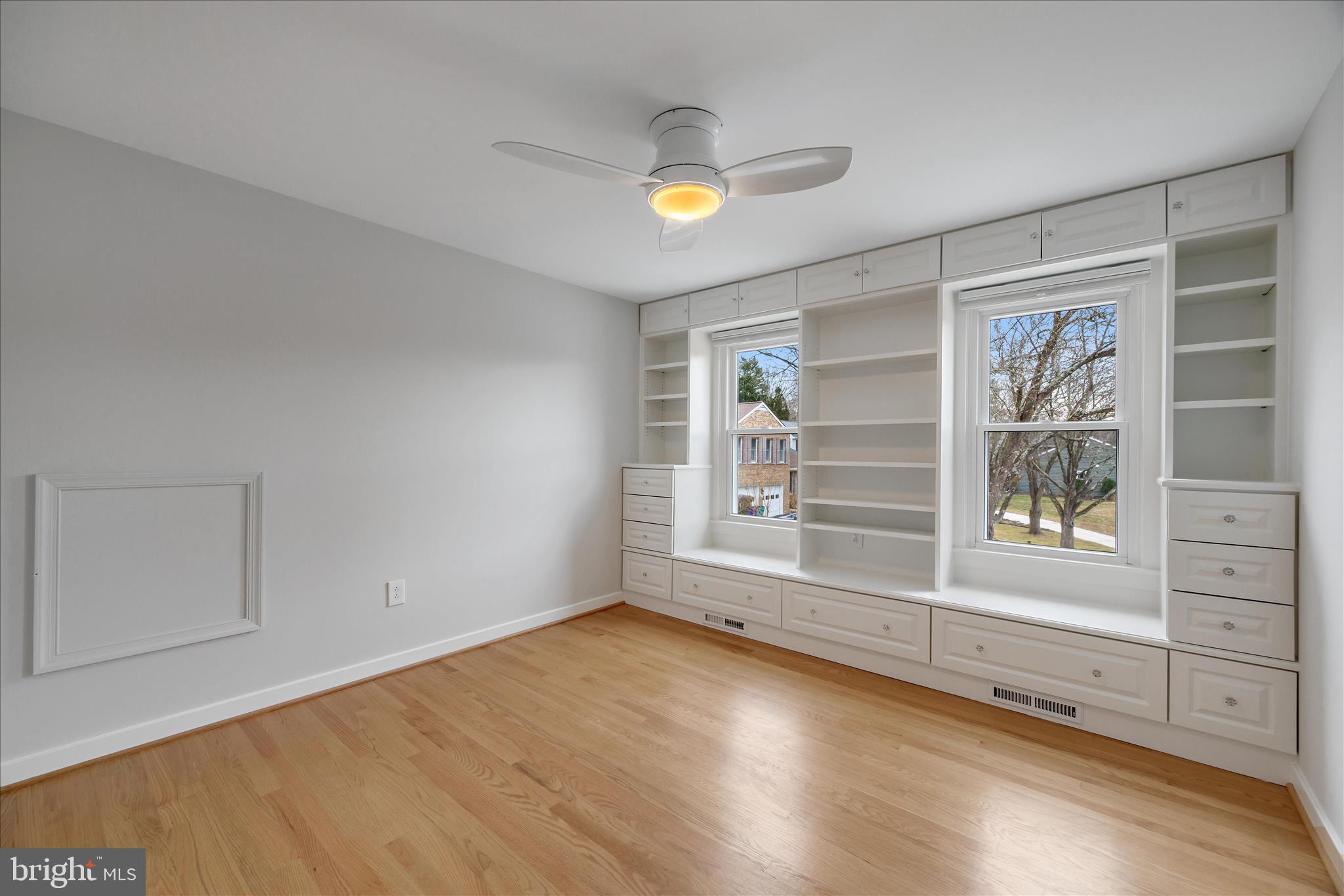 6278 Branch Beech Columbia, MD 21044 - Photo 35 of 57 a view of an empty room with a window and wooden floor
