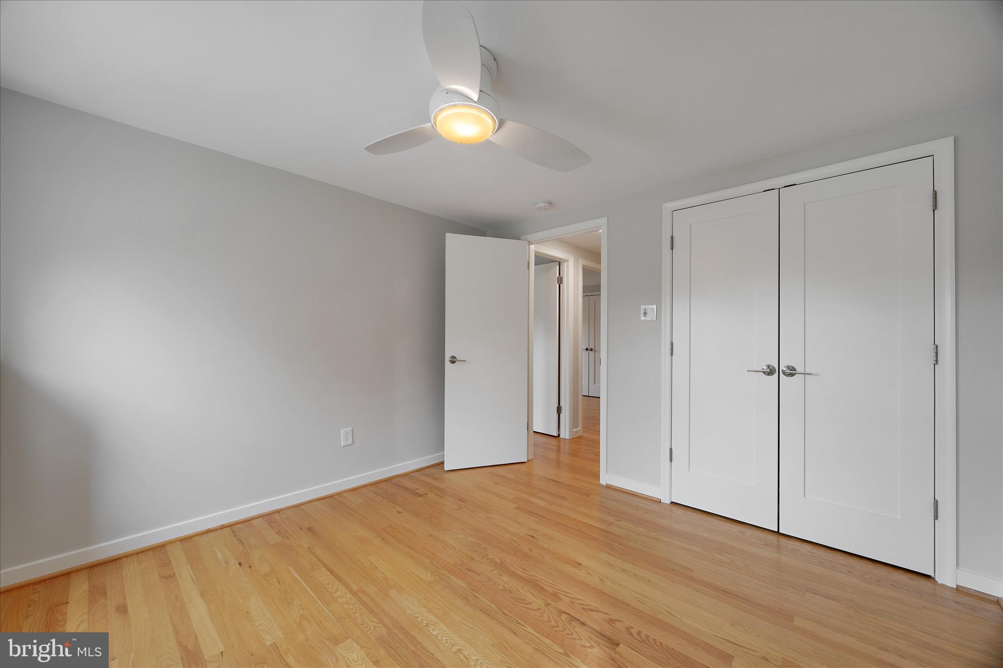 6278 Branch Beech Columbia, MD 21044 - Photo 36 of 57 a view of an empty room and wooden floor