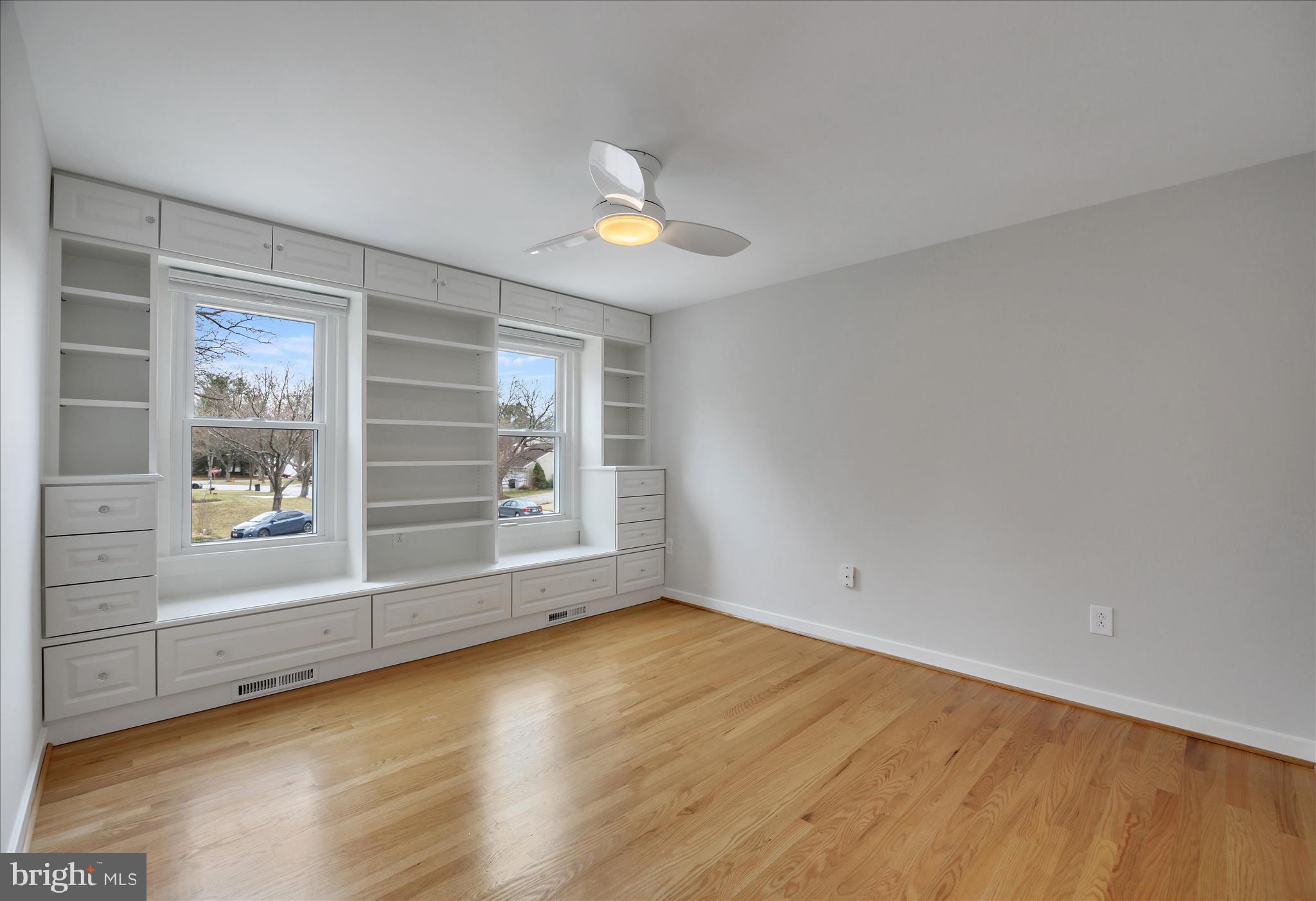 6278 Branch Beech Columbia, MD 21044 - Photo 39 of 57 wooden floor in an empty room with a window