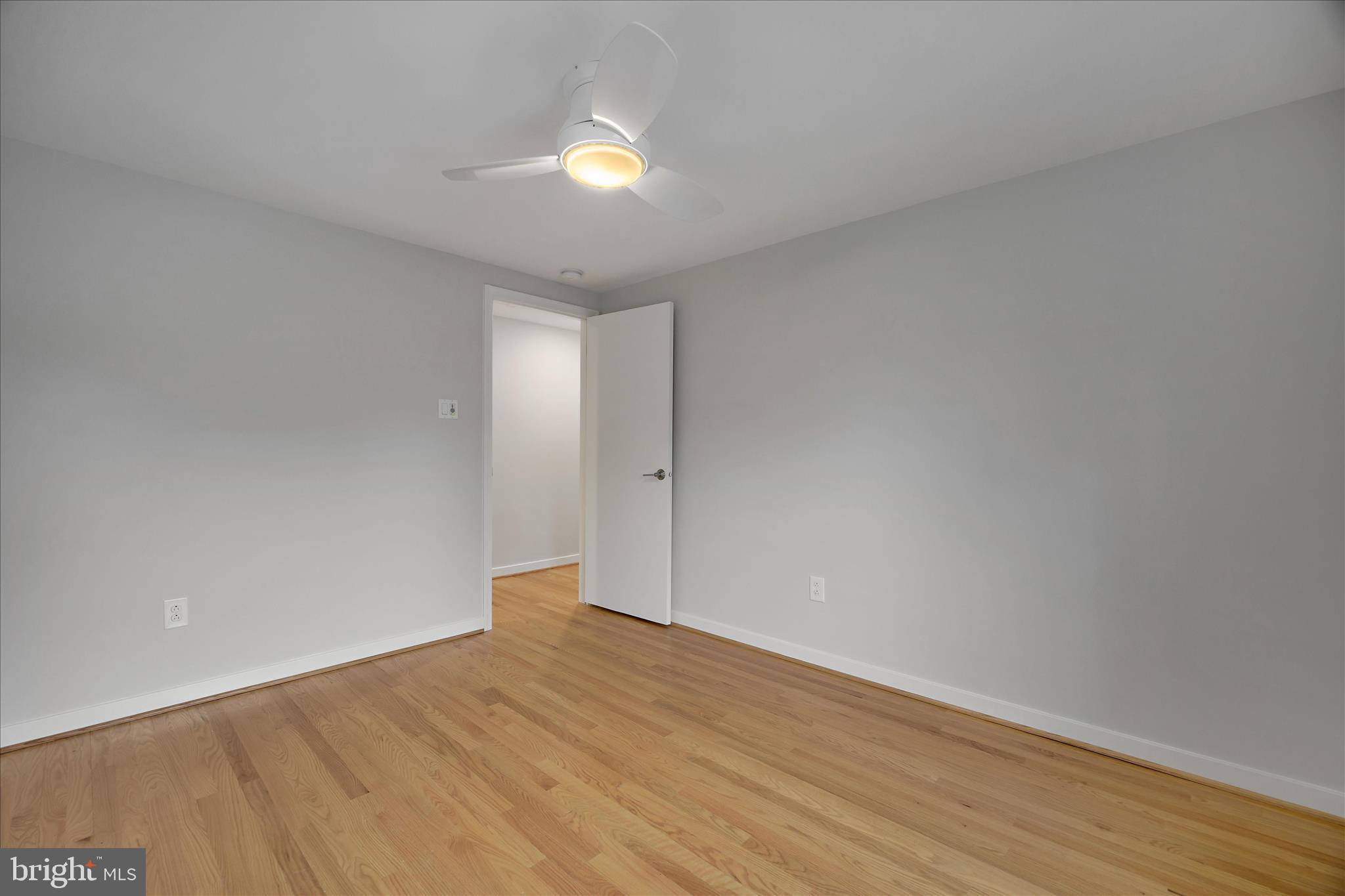 6278 Branch Beech Columbia, MD 21044 - Photo 43 of 57 a view of an empty room and wooden floor