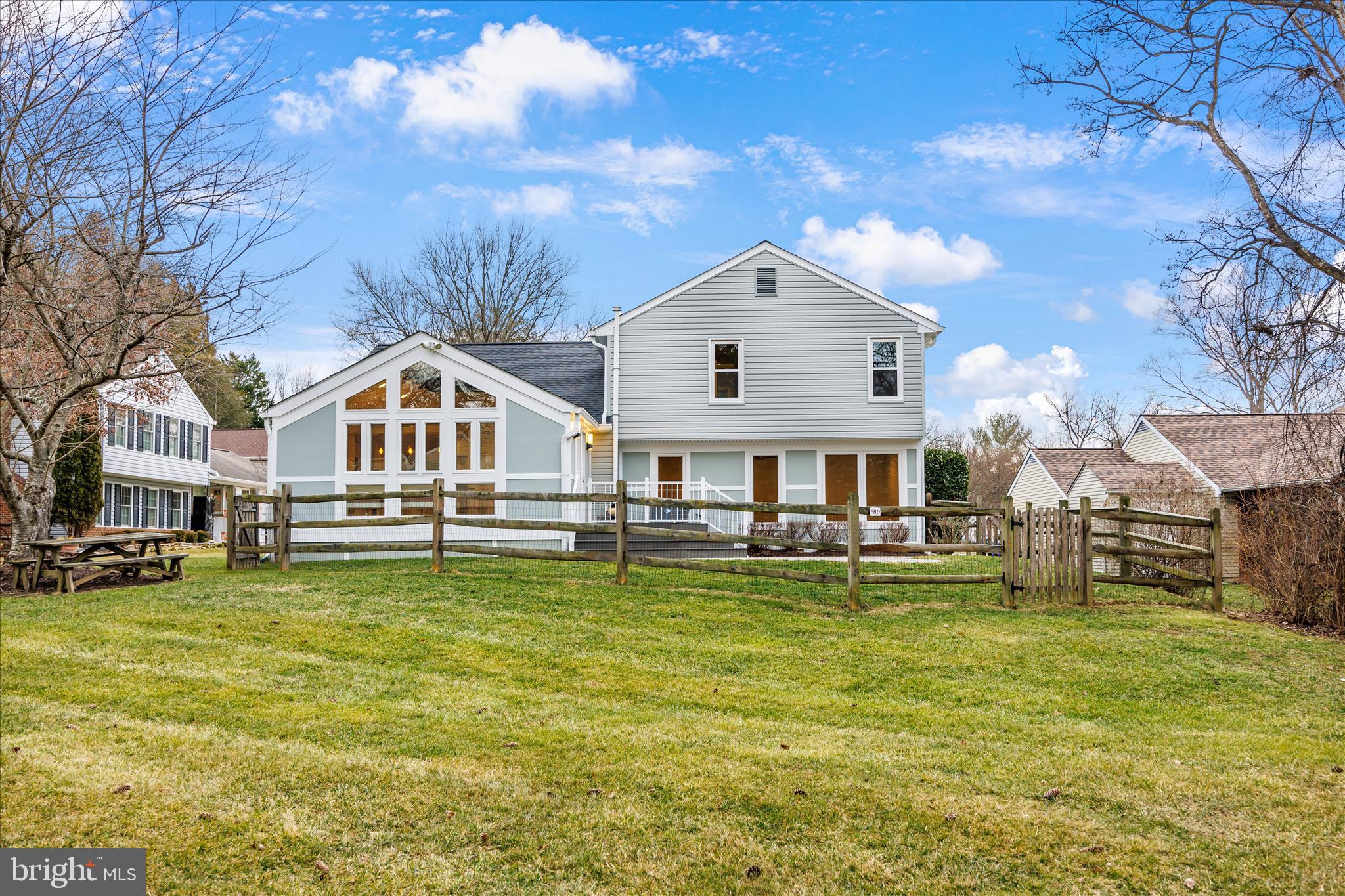 6278 Branch Beech Columbia, MD 21044 - Photo 49 of 57 a aerial view of a house with swimming pool and a yard