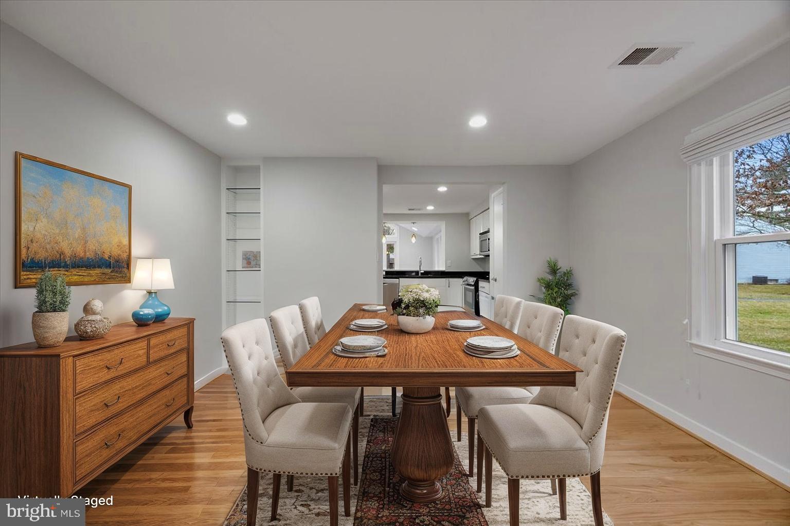 6278 Branch Beech Columbia, MD 21044 - Photo 7 of 57 a view of a dining room with furniture window and wooden floor