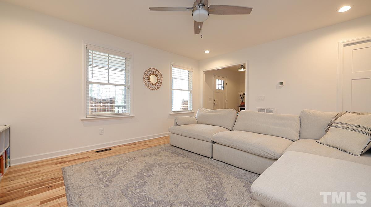 5000 West Pool Road Rougemont, NC 27572 - Photo 11 of 29 a living room with furniture and a large window